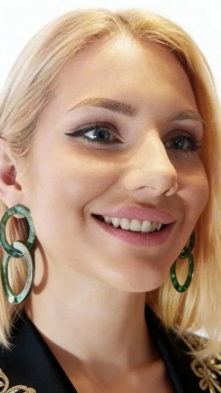 , These striking dangle earrings showcase a captivating fusion of organic beauty and contemporary design, featuring lustrous freshwater pearls nestled within artistic copper circles adorned with a weathered green patina finish. The unique interlocking double-circle design creates dynamic movement and visual interest, making these statement pieces perfect for the modern woman who appreciates distinctive handmade jewelry.
Crafted with meticulous attention to detail, each earring features genuine freshwater pearls that catch and reflect light beautifully, creating an elegant contrast against the oxidized copper's rich green patina. The weathered finish gives these earrings an authentic, vintage-inspired aesthetic while maintaining a thoroughly contemporary appeal. The substantial size and bold silhouette make these earrings ideal conversation starters that effortlessly elevate any outfit.
Drawing inspiration from Greek artisan traditions, these handmade treasures blend classical elegance with modern sophistication. The organic patina finish ensures that each pair develops its own unique character over time, making your earrings truly one-of-a-kind. Their versatile design transitions seamlessly from casual daytime looks to elegant evening ensembles, complementing both bohemian and sophisticated styles.
The secure hook closure ensures comfortable all-day wear, while the lightweight construction prevents ear fatigue despite their impressive presence. These earrings make an exceptional gift for anyone who appreciates artisan-crafted jewelry with distinctive character and timeless appeal.
Store in a dry place away from moisture. Clean gently with a soft cloth, avoiding harsh chemicals that may affect the natural patina finish.