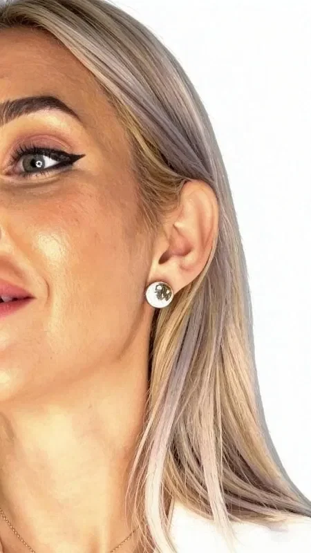 , Discover the unique charm of these white pyrite stud earrings, combining the elegance of minimal design with the natural beauty of iron pyrite. Designed by Greek Jewelry Designer Aikaterini Chalkiadaki, these exceptional handmade earrings are the perfect choice for every woman who values quality and authenticity.

Each earring features a round pyrite stone in a soft chalk-white color, delicately surrounded by finely crafted brass. Their small size makes them ideal for everyday wear, while their unique aesthetic adds a touch of sophistication to any outfit.

The combination of natural pyrite with quality brass creates a piece of jewelry that stands out for its durability and timeless value. These women's stud earrings are suitable both for professional appearances and casual moments.