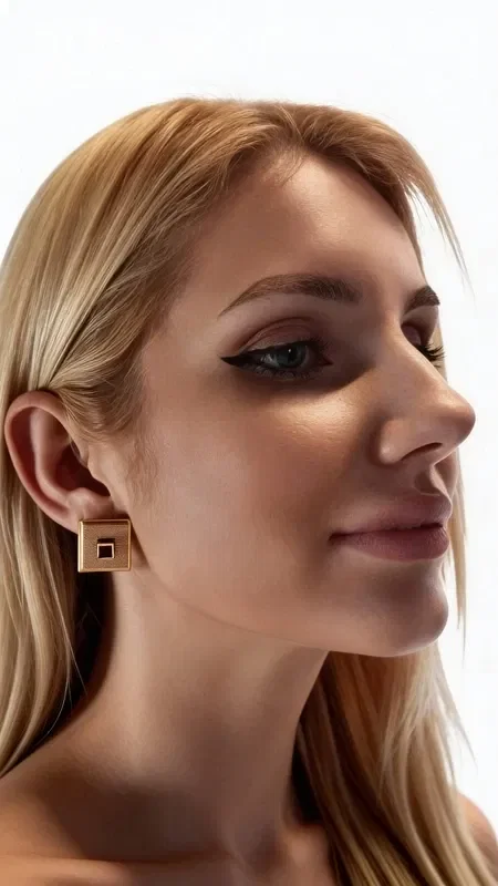 , Discover the unique beauty of handmade wooden stud earrings, combining the natural warmth of wood with the golden shine of brass. These striking square earrings are designed by Greek Jewelry Designer Aikaterini Chalkiadaki and are the perfect choice for the modern woman seeking stylish jewelry with character.

Their geometric shape and minimalist design make them ideal for everyday wear, while adding a refined touch to any look. The combination of natural materials creates a sense of organic elegance that suits both casual and more formal outfits. These original women's earrings are an excellent addition to your jewelry collection. Pair them with other pieces from the same collection for a complete boho chic style. To preserve them, avoid contact with water and store them in a dry place.
